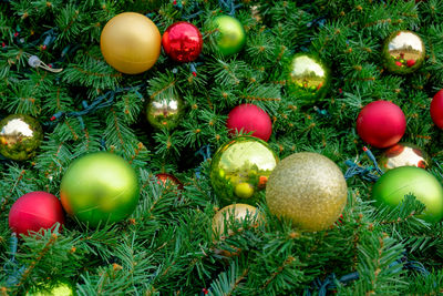 Close-up of christmas decorations on field