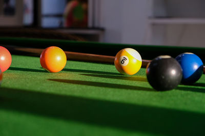 Close-up of multi colored ball on table