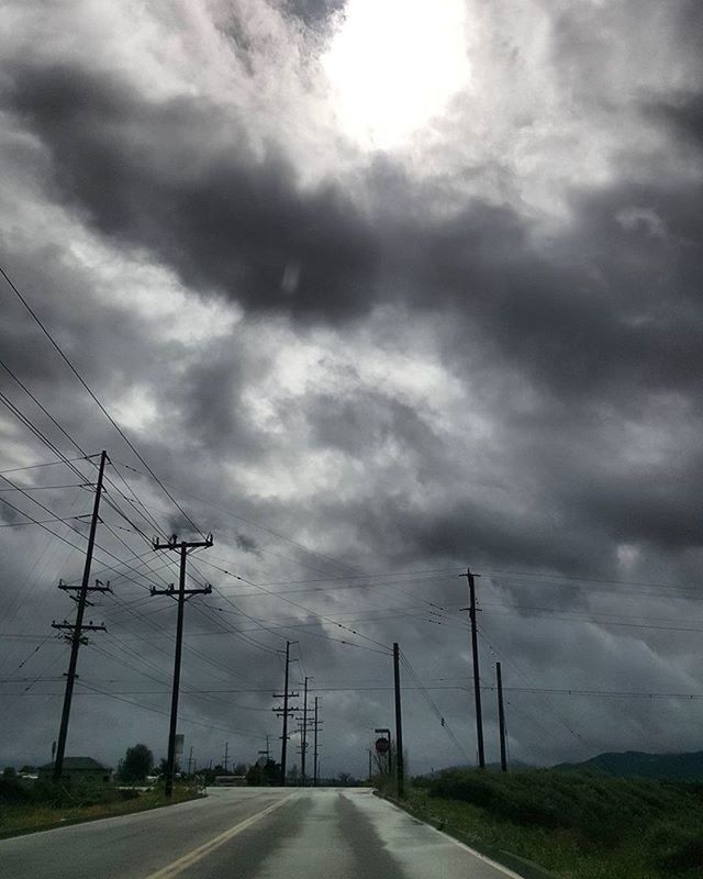 sky, the way forward, road, cloud - sky, cloudy, transportation, electricity pylon, diminishing perspective, vanishing point, weather, connection, power line, overcast, fuel and power generation, cloud, electricity, empty road, country road, power supply, street