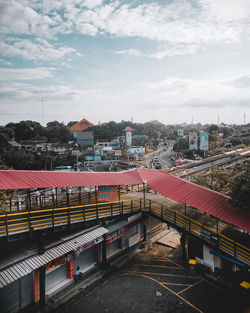 High angle view of train against buildings in city