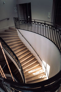 Low angle view of marble spiral staircase
