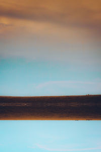 Scenic view of land against sky