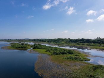Scenic view of river against sky
