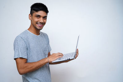 Young man using mobile phone