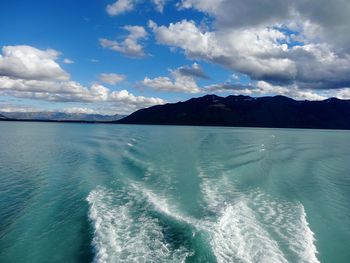 Scenic view of sea against cloudy sky