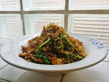 Close-up of food in plate on table