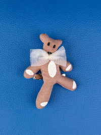 High angle view of toy on blue background
