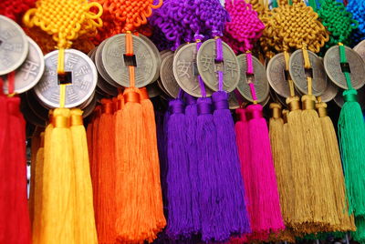 Close-up of multi colored tassels for sale at market