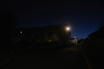 Illuminated street light at night