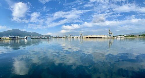 Scenic view of sea against blue sky