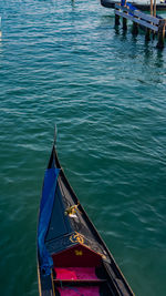 High angle view of boat moored in lake