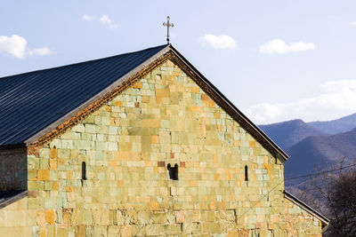 Low angle view of old building against sky