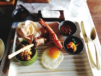 High angle view of breakfast served on table