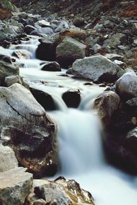 Stream flowing through rocks