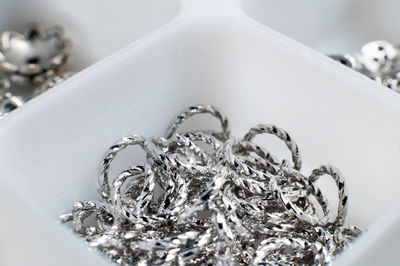 Close-up of wedding rings on table