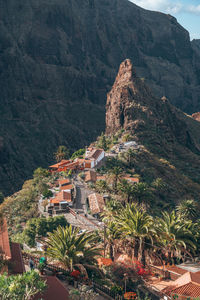 High angle view of townscape against mountain