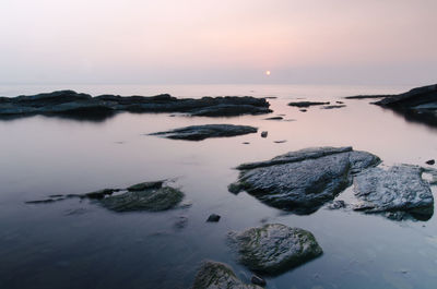 Scenic view of sea against sky during sunset