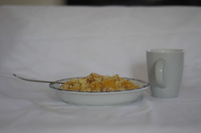 Close-up of breakfast served on table