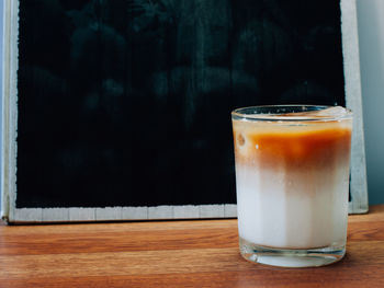 Glass of coffee on table