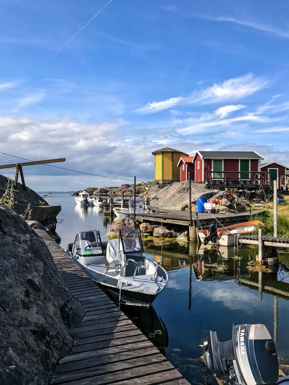 water, nautical vessel, built structure, moored, sky, architecture, building exterior, outdoors, mode of transport, day, transportation, cloud - sky, no people, nature, sea, harbor