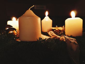 Close-up of illuminated candles during christmas