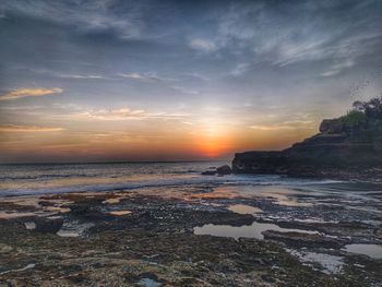 Scenic view of sea against sky during sunset