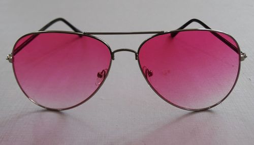 Close-up of sunglasses on table