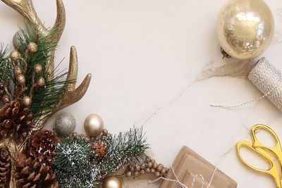 Close-up of christmas ornaments on marble