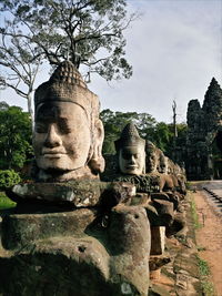 Statue of historic building against sky