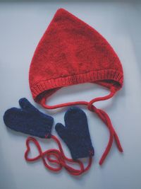 High angle view of hat on table against white background