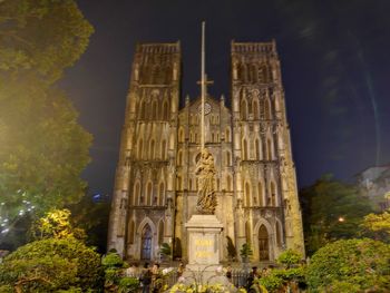 Low angle view of historical building against sky at night