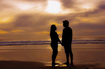 Scenic view of sea at sunset