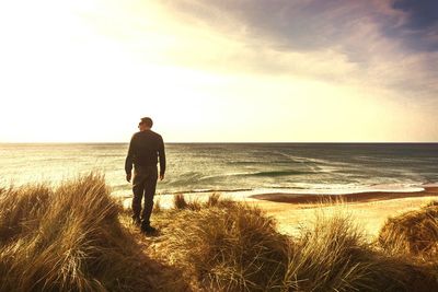 Scenic view of sea at sunset