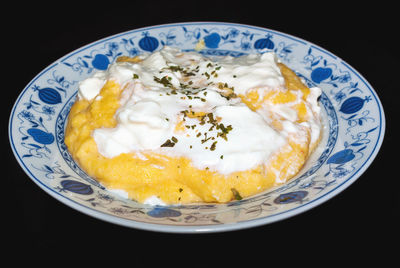 Close-up of breakfast served on table