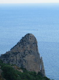 Scenic view of sea against blue sky