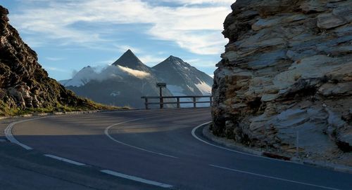 Country road leading towards mountains