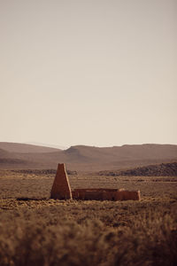 Scenic view of desert against clear sky