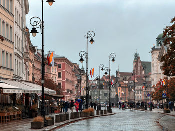 Canal amidst buildings in city