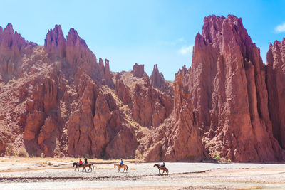 Group of people on rock