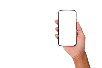 Hand holding smart phone over white background