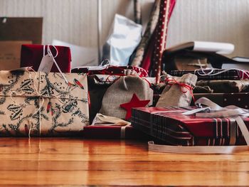 Gift boxes on hardwood floor at home