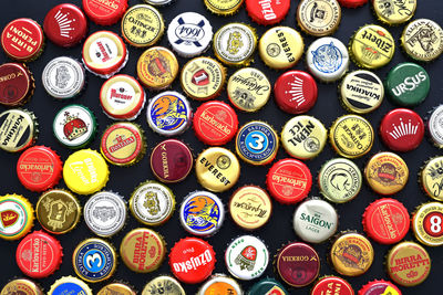 Background of beer bottle caps, a mix of various european and asian brands