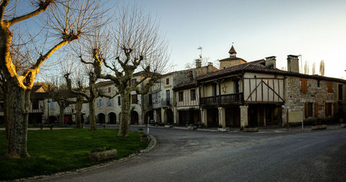 Street amidst buildings against sky