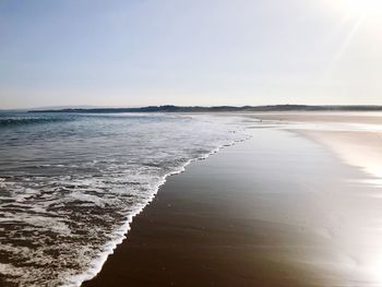 Scenic view of sea against clear sky