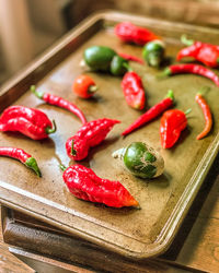 High angle view of chili peppers on table