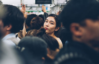 Portrait of young people at music concert