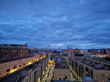 High angle view of buildings in city against sky