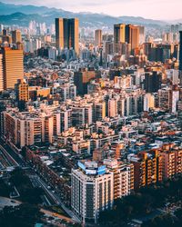 High angle view of illuminated cityscape against sky