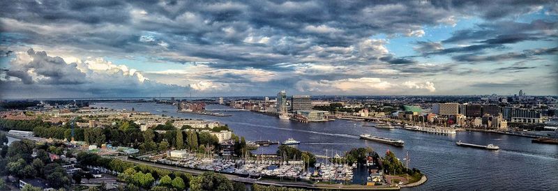 High angle view of bridge over river against cloudy sky