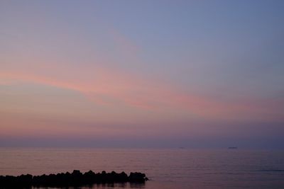 Scenic view of sea at sunset